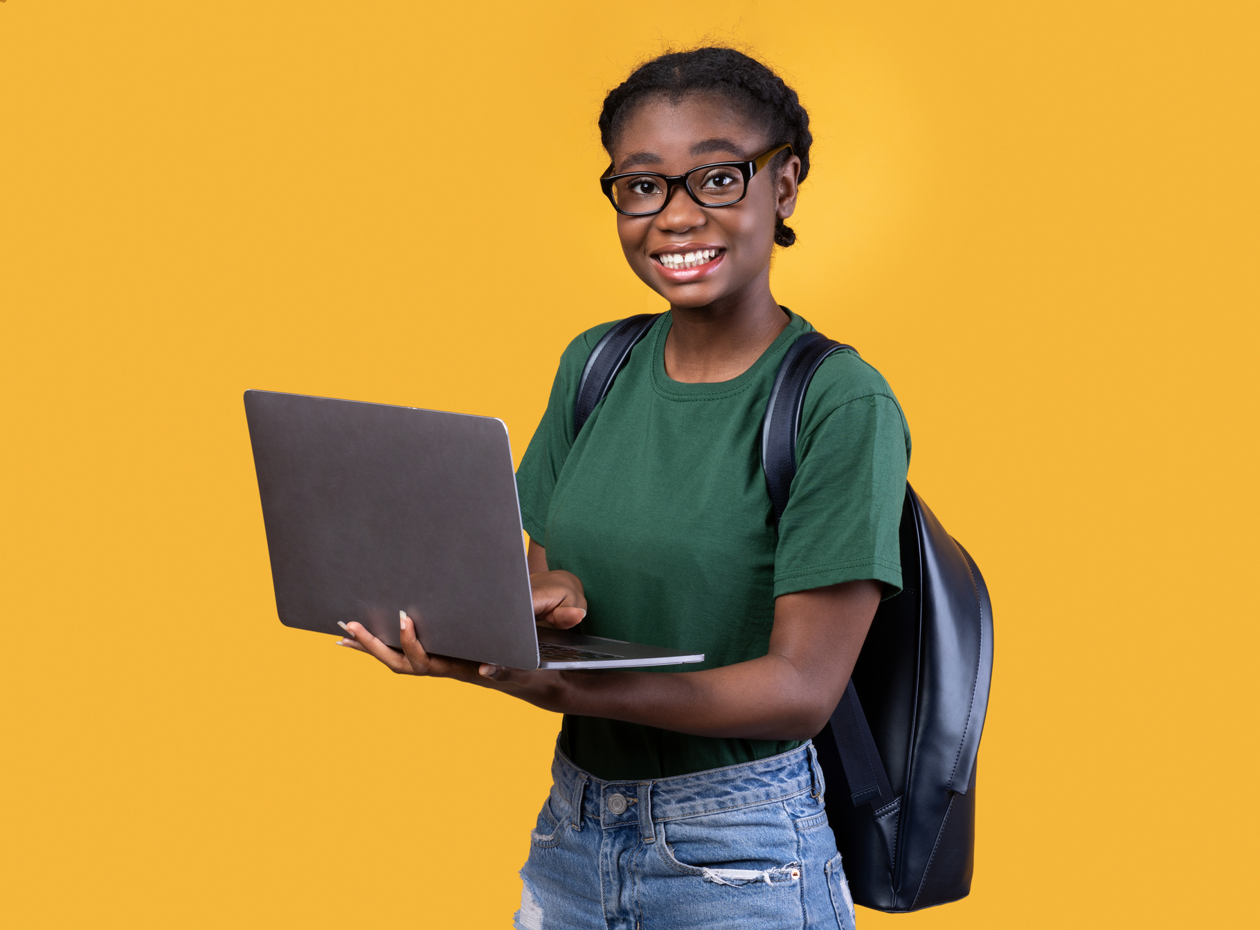 Happy Black Student Girl Using Laptop Computer Over Yellow Background